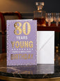 80 Years Young Happy 80th Birthday Card with gold foil on lilac background
