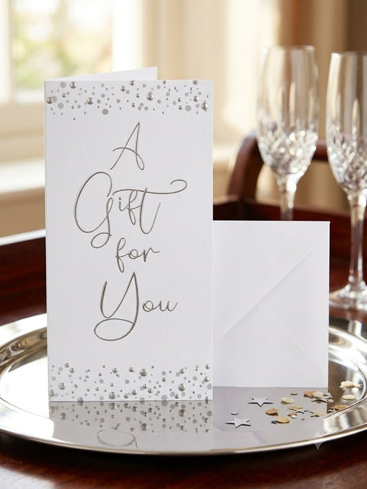 A Gift for You slim wallet card with silver script lettering and silver dot gem border on white background with white envelope