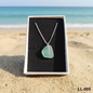 LL-005 Norfolk teal seaglass necklace on beach