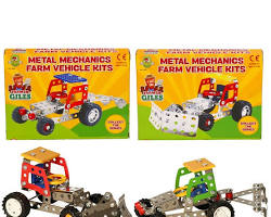 Metal Mechanics Farm Vehicle Kits by Giles showing two box sets side by side with assembled red and green metal tractor models in front