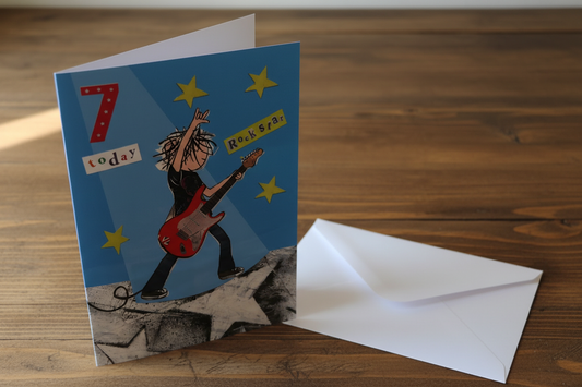 7 Today Rock Star guitar boy birthday card standing upright spine-left slightly open in a cosy lifestyle setting
