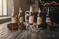 Antler bottle opener styled on a dark wooden surface with craft beer bottles and pine cones, warm moody home bar atmosphere