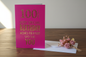 100 Today birthday card standing open spine-left in a cosy lifestyle setting
