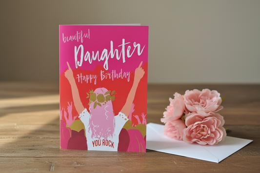 Beautiful Daughter You Rock birthday card standing open spine-left in a cosy lifestyle setting