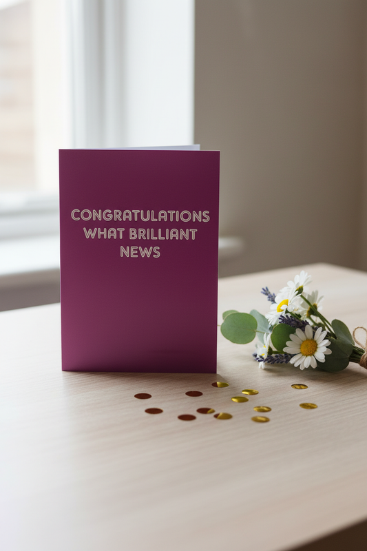 Congratulations What Brilliant News card lifestyle image on wooden desk