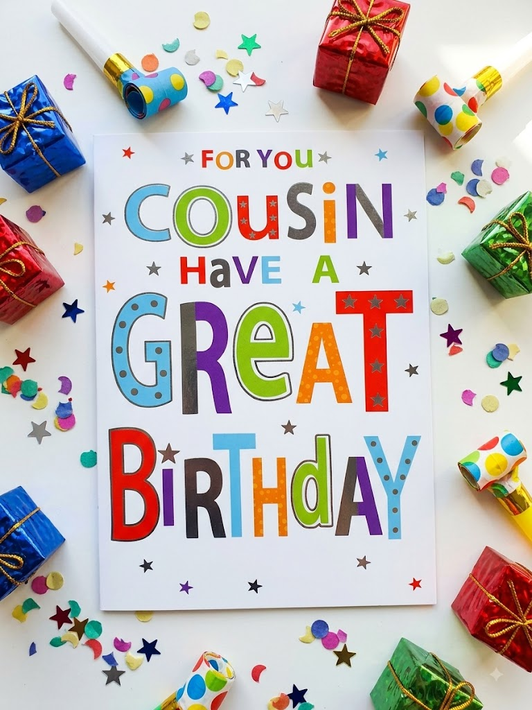 Bright bold birthday card for a cousin reading For You Cousin Have a Great Birthday in multicoloured lettering with stars and confetti