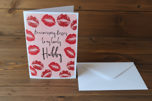 Anniversary Kisses Hubby card standing upright spine-left slightly open in a cosy lifestyle setting